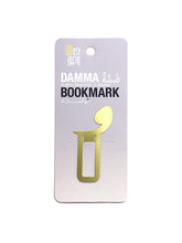 Load image into Gallery viewer, Arabic metal bookmark in brass. Shape of a damma diacritic