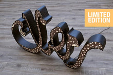 Load image into Gallery viewer, A 1m long ramadan decoration, 3D free standing sign light of the term "Ramadan" in Arabic calligraphy. Metal front with Arabic letters cutout