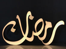 Load image into Gallery viewer, A 1m long ramadan decoration, 3D free standing sign light of the term "Ramadan" in Arabic calligraphy.