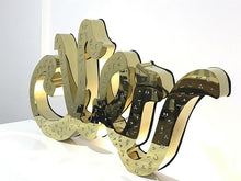 Load image into Gallery viewer, 1m long Ramadan decoration in mirror gold stainless steel, 3D free standing light sign of the term "Ramadan" in Arabic calligraphy. perspective view