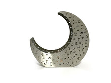 Load image into Gallery viewer, crescent shaped candle holder in brushed stainless steel with laser cut design of Arabic letters &amp; diacritics

